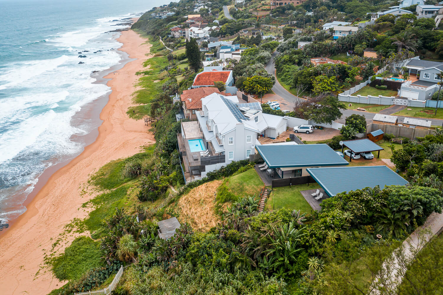 aeriel view of units with ocean